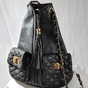 Charming Charlie bag chained backpack